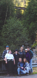 The group with the bridge in the background